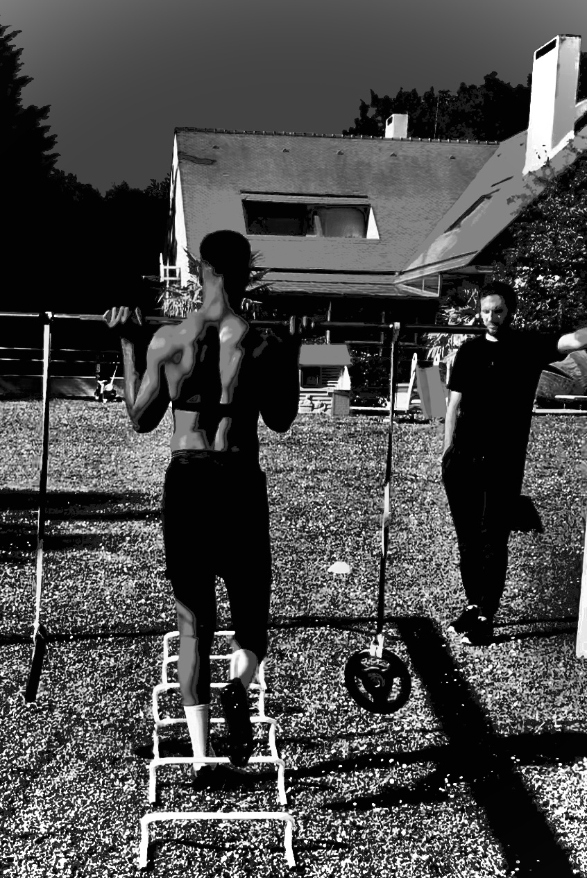 Brieuc Gobé en salle avec un athlète